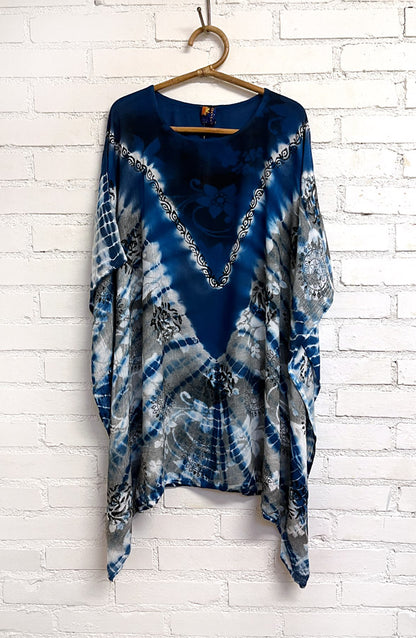 Meeran merenrannalla unelmointi – Kaftaani