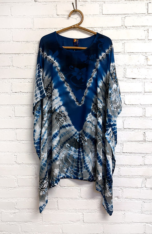 Meeran merenrannalla unelmointi – Kaftaani